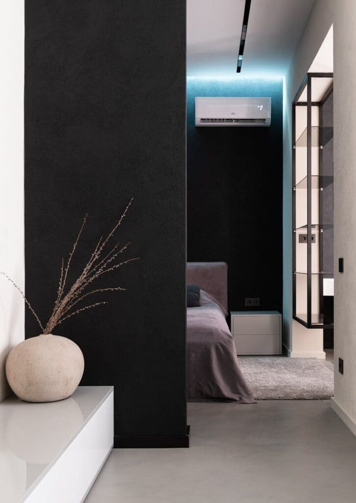 Comfortable soft big bed and small wooden bedside table with carpet in bedroom Photo by Max Vakhtbovycn Several indicators suggest it might be time to seek professional AC services in Los Angeles: Unusual noises during operation Reduced airflow or warm air output Frequent cycling or unexpected shutdowns Rising energy costs without increased usage